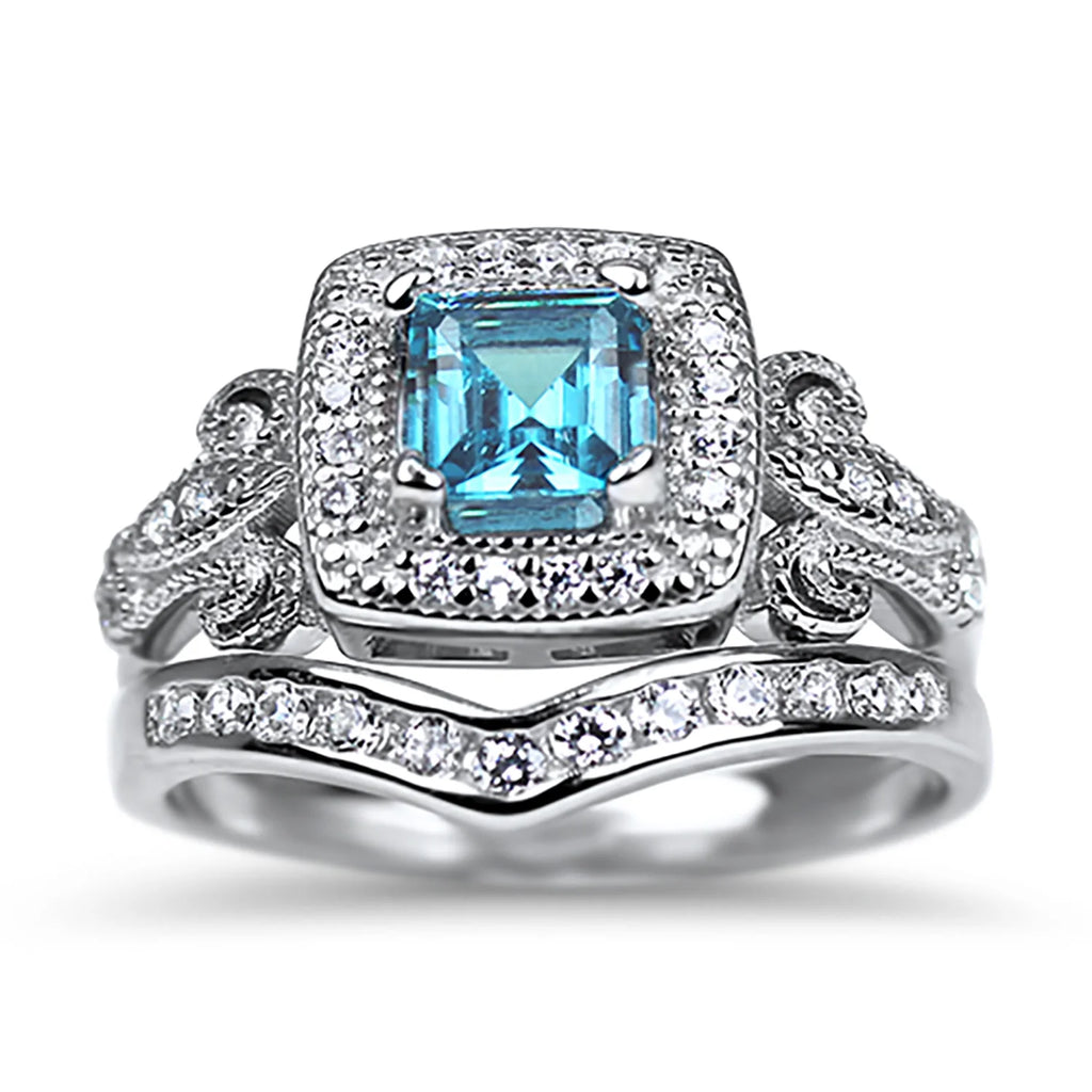 Trio His Hers Blue Topaz CZ Silver Wedding Engagement Ring Set Titanium O554